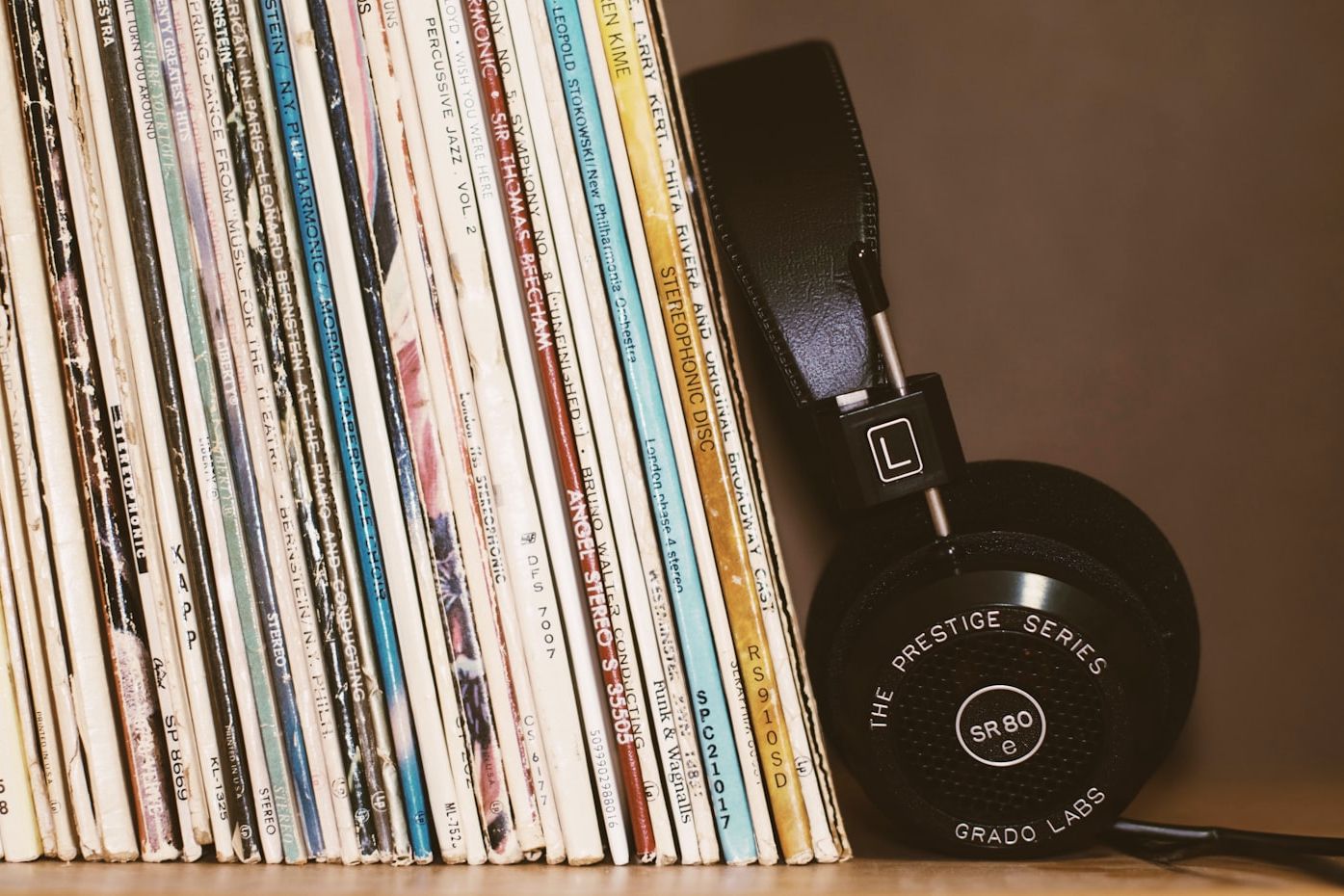 Rows of vinyl records in a well-worn collection